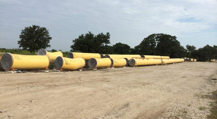 unused yellow water pipes
